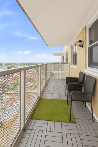 a view of a chairs and table in the patio