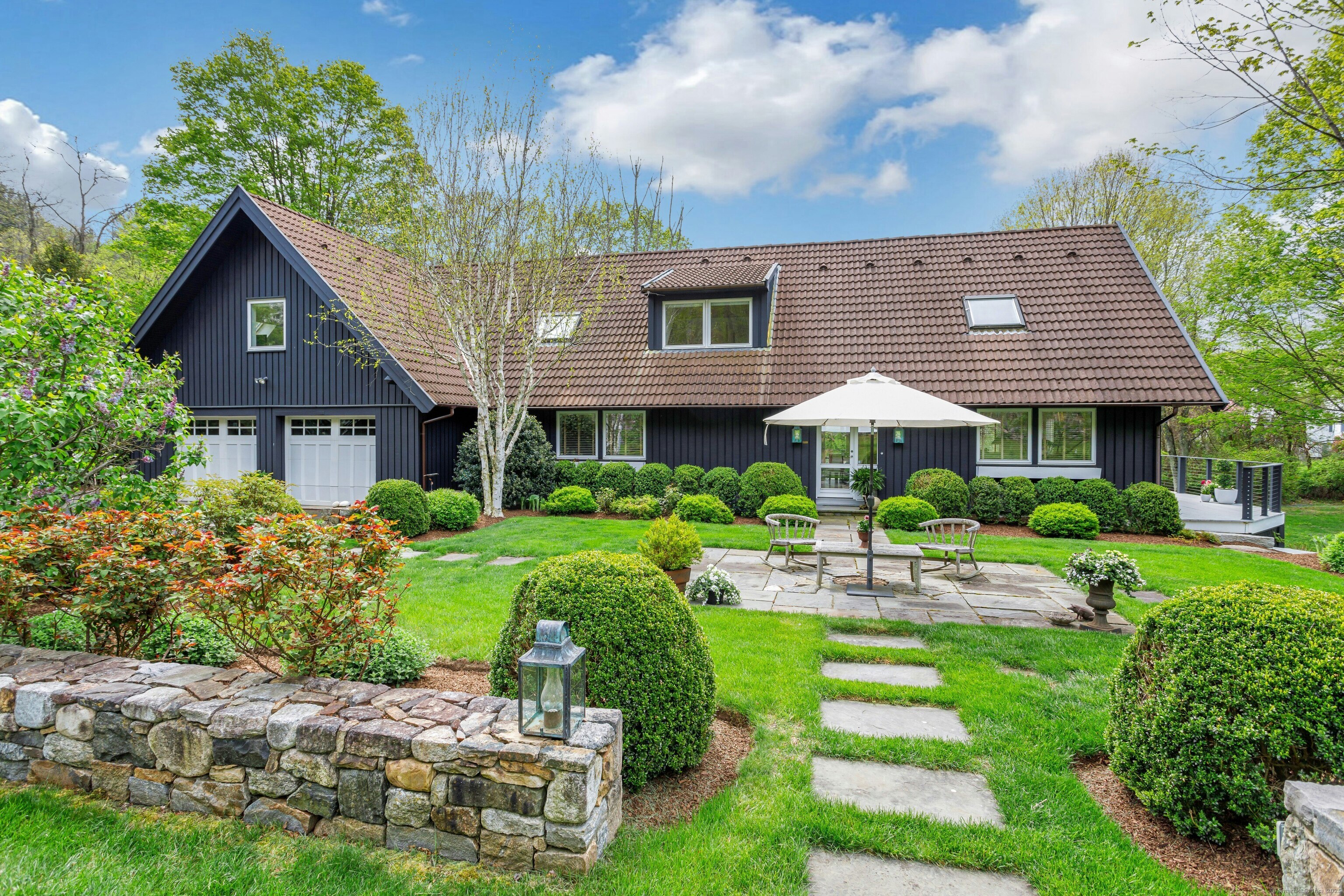 12 Old Redding Road Redding, CT 06877 - Photo 1 of 1 a front view of a house with garden