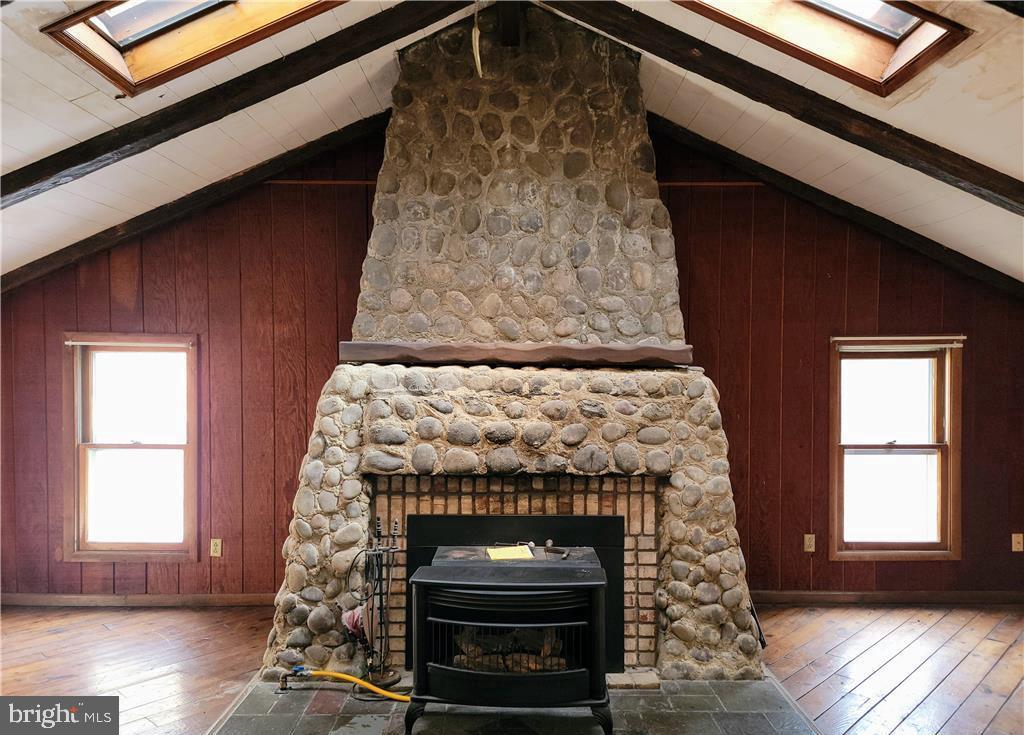 313 North Fireline Road Parryville, PA 18071 - Photo 9 of 56 Hand laid river rock fireplace