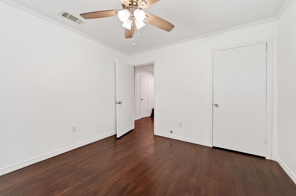505 Laurel Road Athens, TX 75751 - Photo 25 of 32 Interior space featuring wood-finish flooring, white walls, and a ceiling fan with integrated lighting