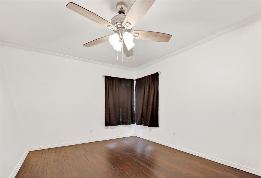 505 Laurel Road Athens, TX 75751 - Photo 26 of 32 Spacious room featuring wood-finish flooring, white walls, and crown molding