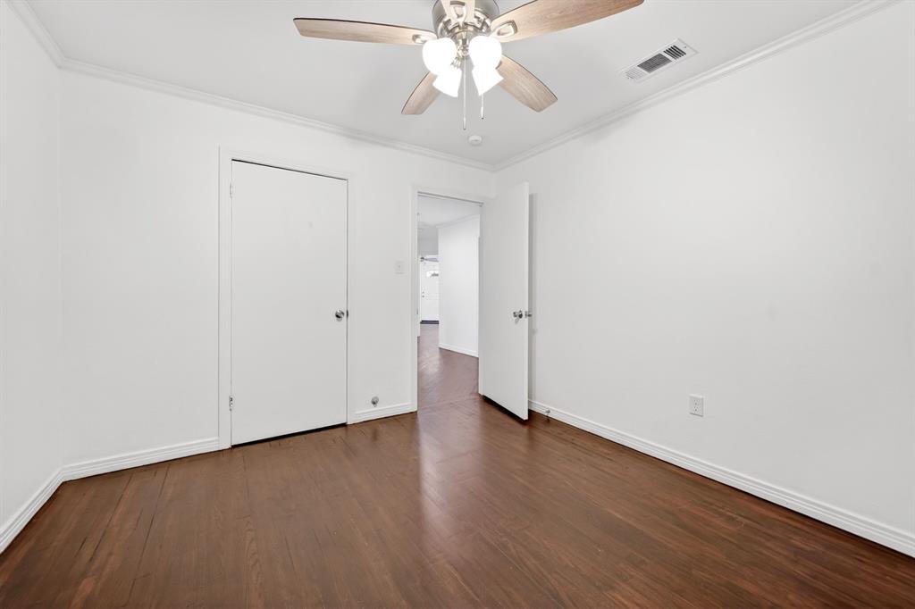 505 Laurel Road Athens, TX 75751 - Photo 27 of 32 Hardwood-finish flooring complements crisp white walls and crown molding