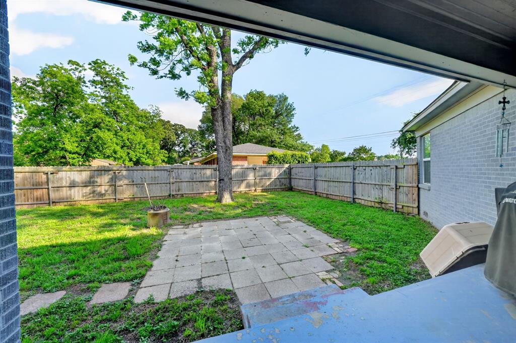 505 Laurel Road Athens, TX 75751 - Photo 28 of 32 Private backyard featuring a full perimeter wooden fence, a mature shade tree, and a concrete paver patio