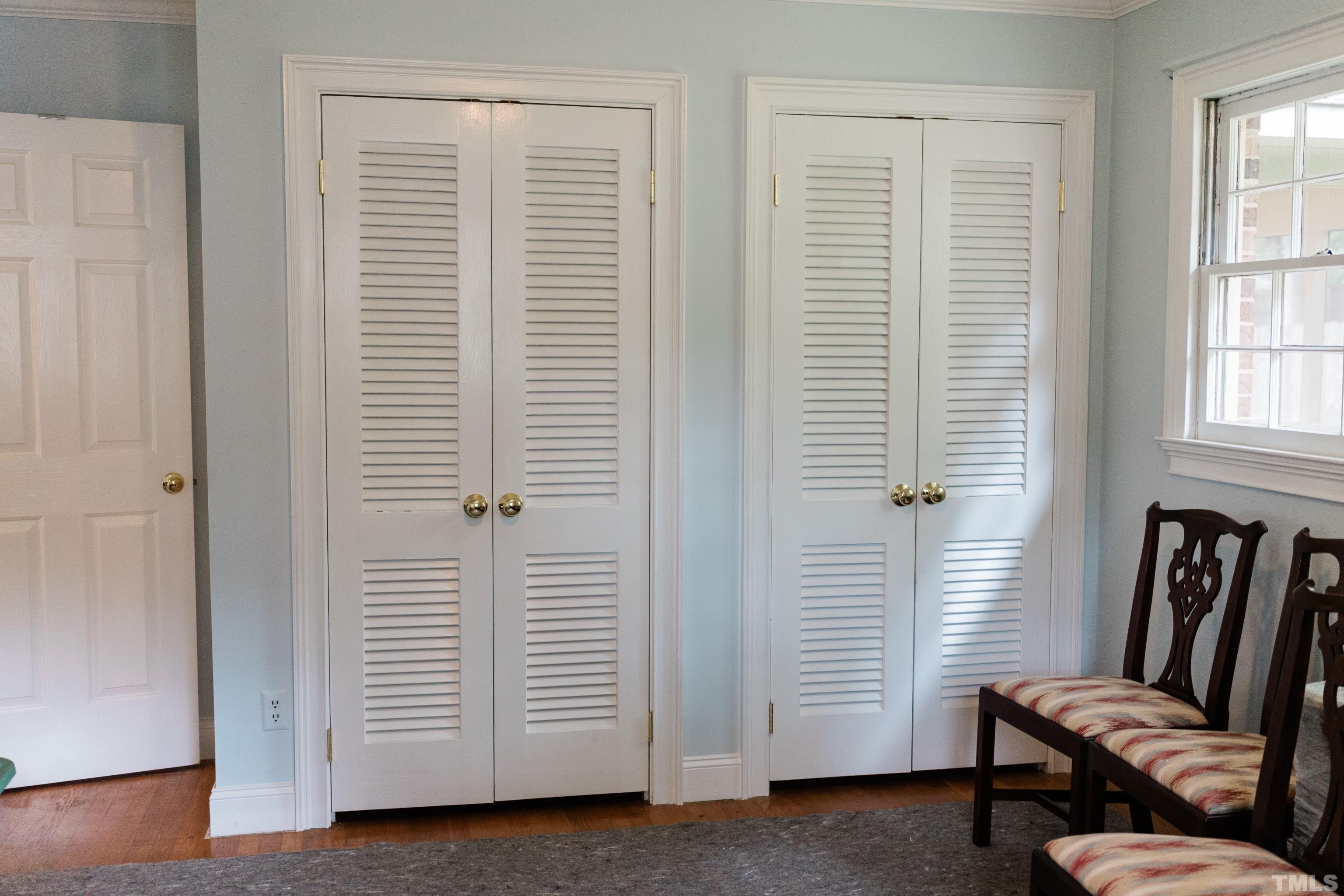 423 East Rowan Street Raleigh, NC 27609 - Photo 17 of 20 a view of a room with furniture and a window