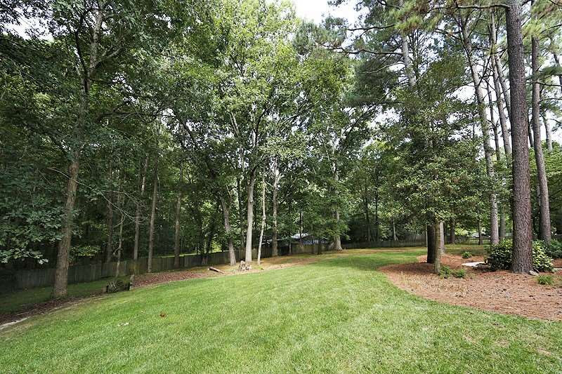 11021 Coachmans Way Raleigh, NC 27614 - Photo 23 of 24 The huge back yard is private and fenced, and can entertain a crowd with room to spare! Exterior Back