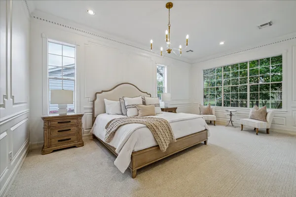 a bedroom with a bed and closet