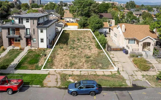an aerial view of a house with swimming pool