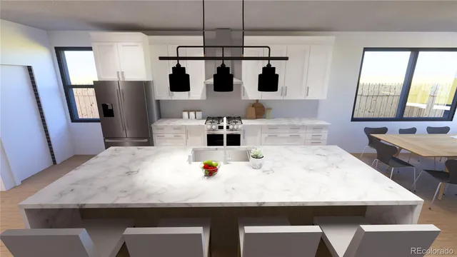 a view of kitchen island with stainless steel appliances