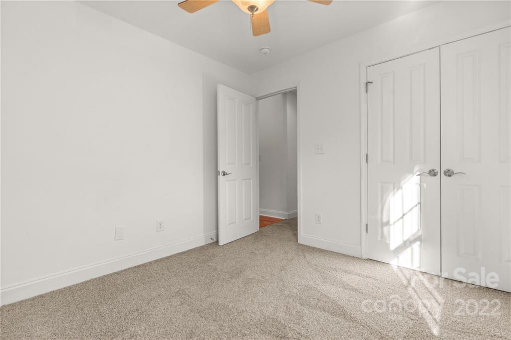 38 Grove End Road, Unit LOT/2 Fletcher, NC 28732 - Photo 25 of 39 an empty room with windows