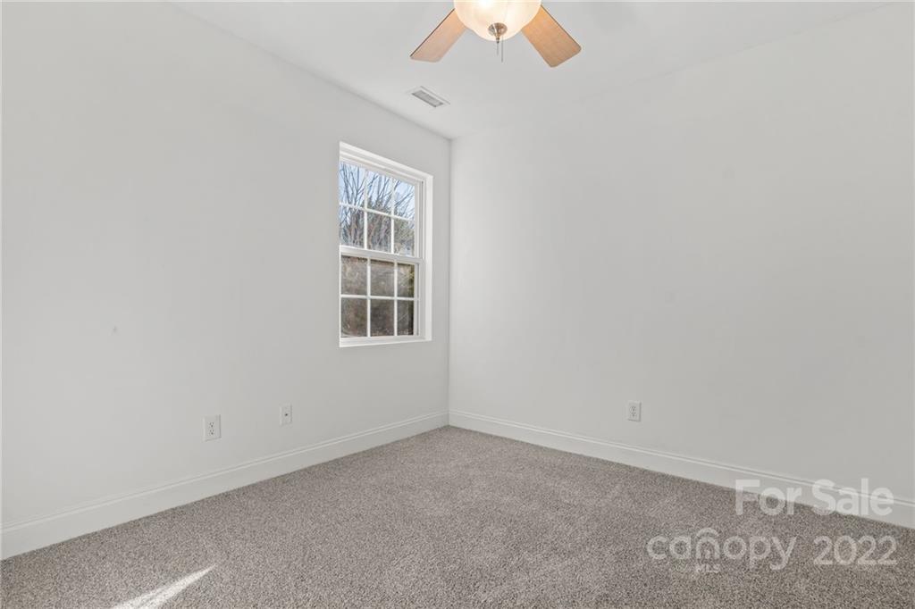 38 Grove End Road, Unit LOT/2 Fletcher, NC 28732 - Photo 26 of 39 an empty room with a window