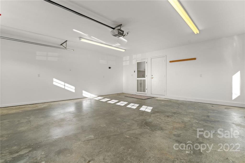38 Grove End Road, Unit LOT/2 Fletcher, NC 28732 - Photo 34 of 39 a view of a big room with closet and windows