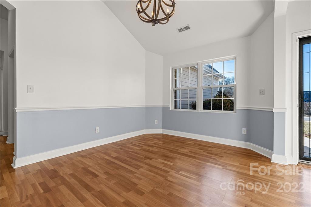 38 Grove End Road, Unit LOT/2 Fletcher, NC 28732 - Photo 4 of 39 a view of empty room with wooden floor and fan