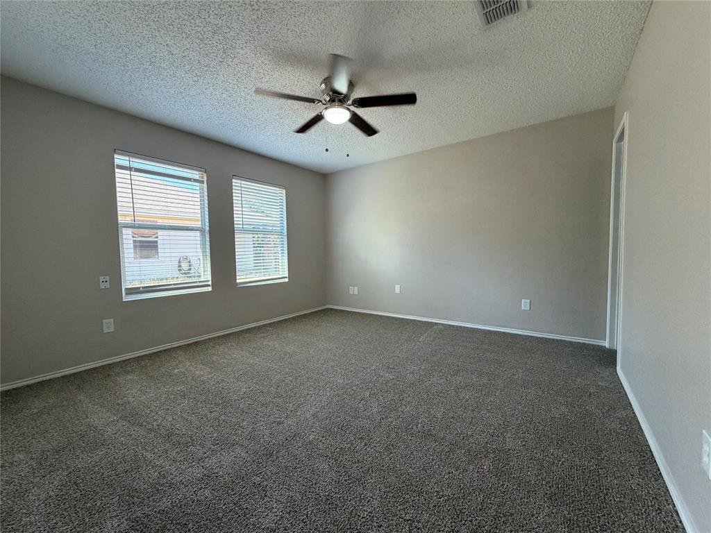 1826 Trailview Drive Terrell, TX 75160 - Photo 19 of 27 a view of an empty room with a window