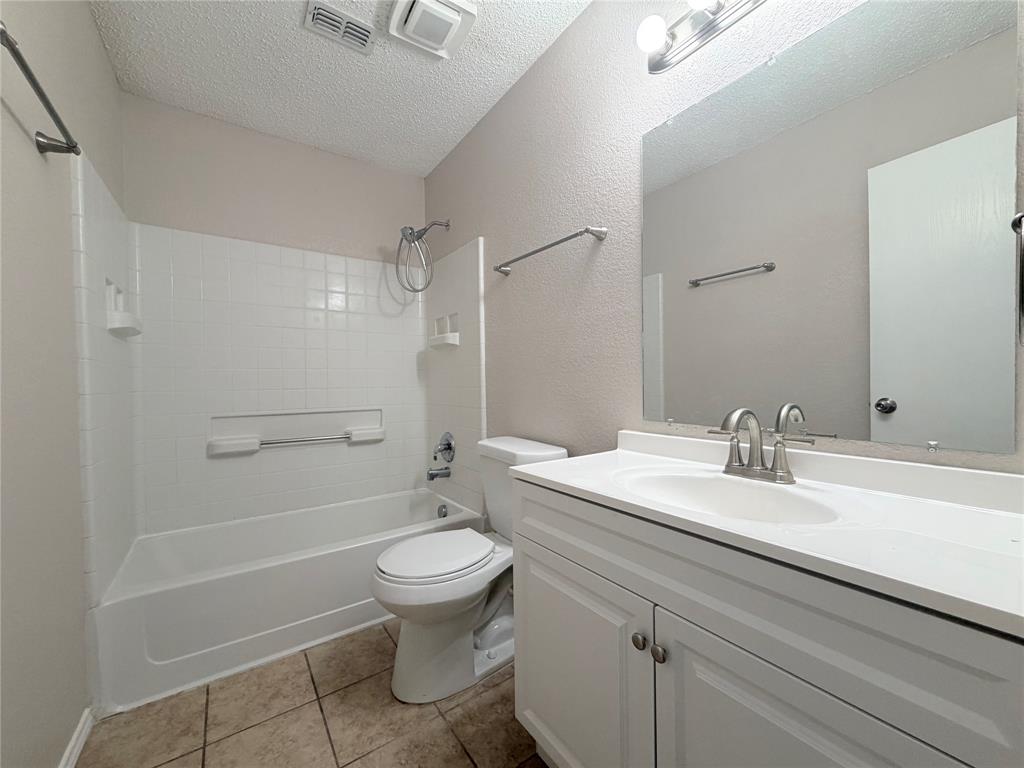 1826 Trailview Drive Terrell, TX 75160 - Photo 24 of 27 a bathroom with a sink a toilet and shower