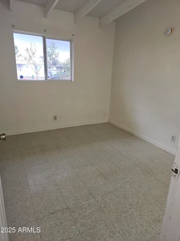 an empty room with a window