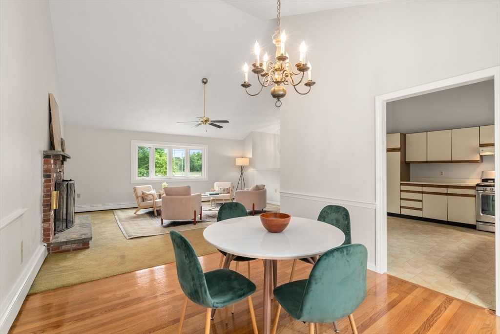 16 Shelley Road Arlington, MA 02476 - Photo 6 of 30 a view of a dining room with furniture a chandelier and wooden floor