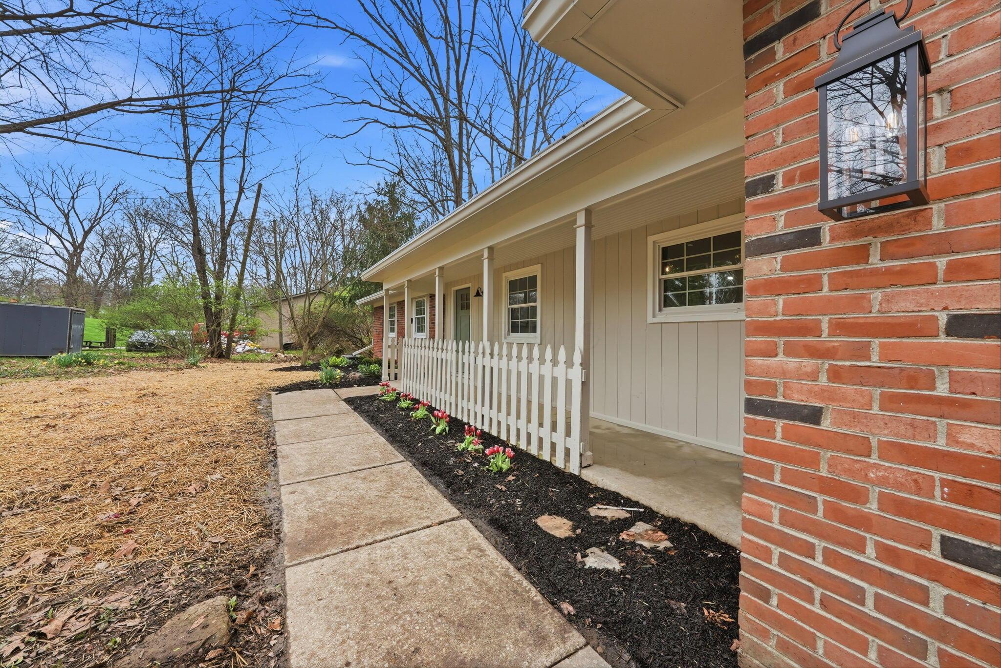 4445 Central College Road Westerville, OH 43081 - Photo 11 of 80 Enjoy the sounds of nature from your front porch!
