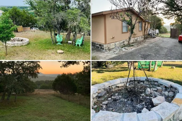 a view of a house with a backyard