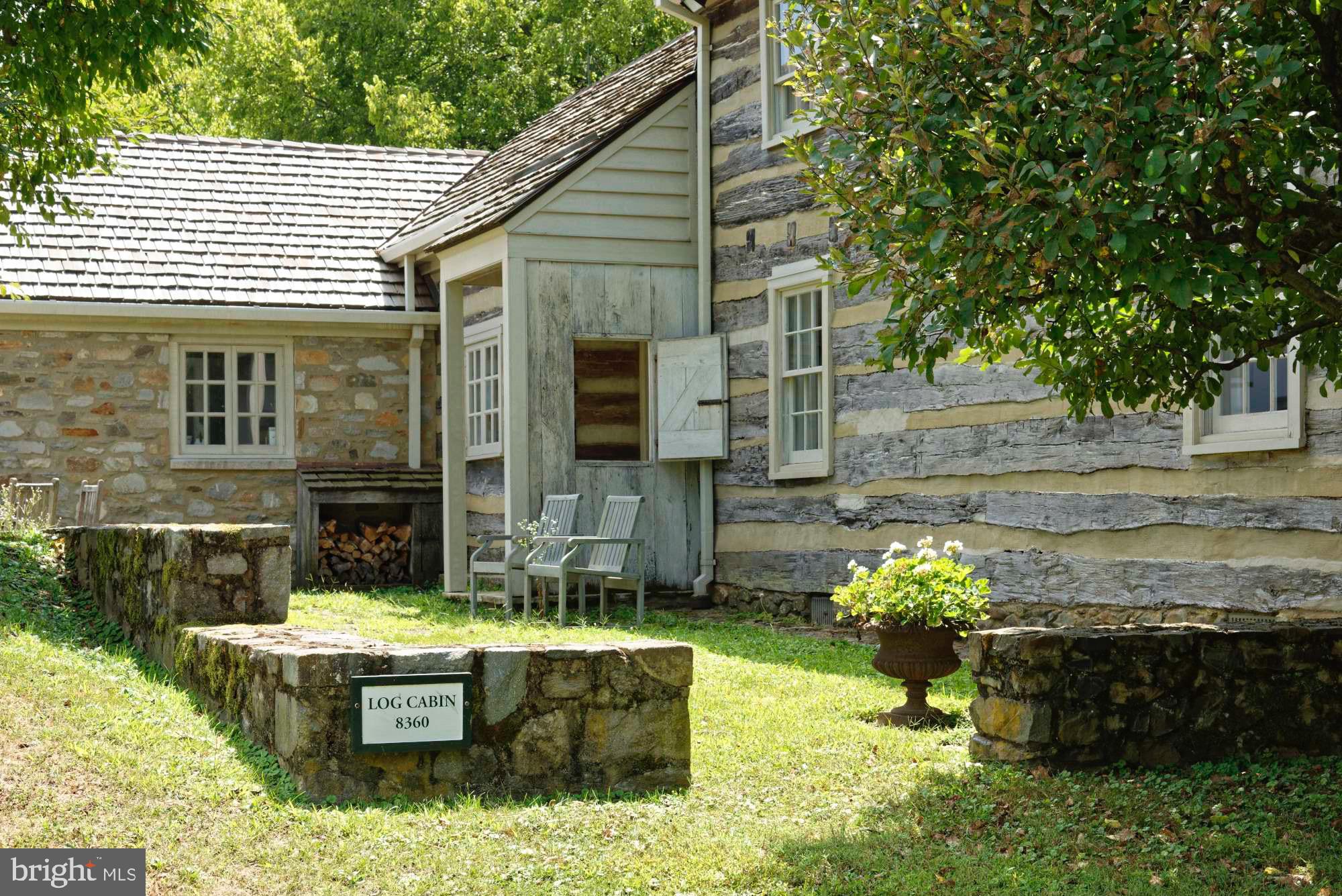 8360 Oak Spring Road Marshall, VA 20115 - Photo 2 of 58 Stone hardscape surrounds the log cabin