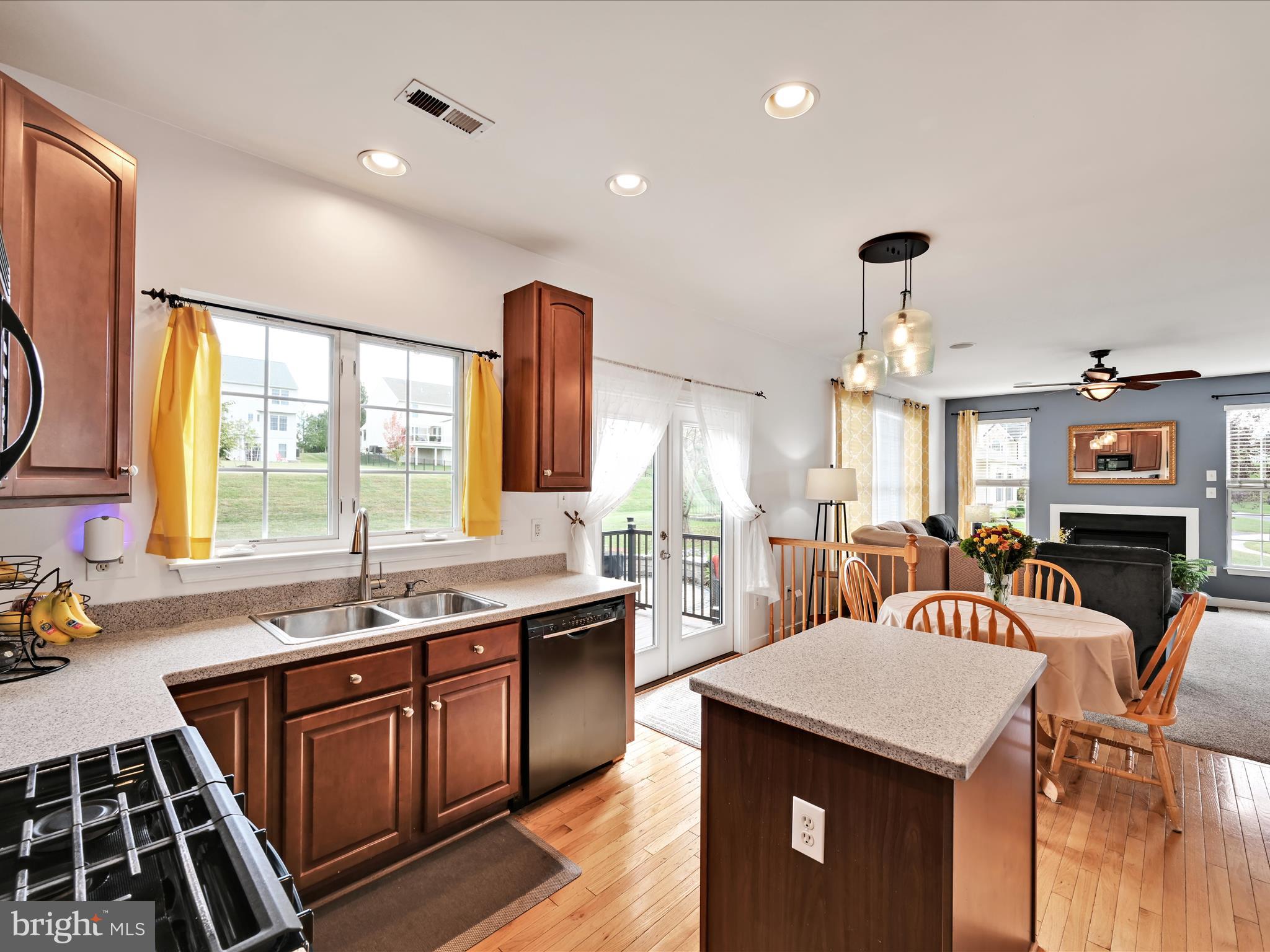 7641 Pinewild Road Seven Valleys, PA 17360 - Photo 12 of 42 a kitchen with a sink stove and cabinets