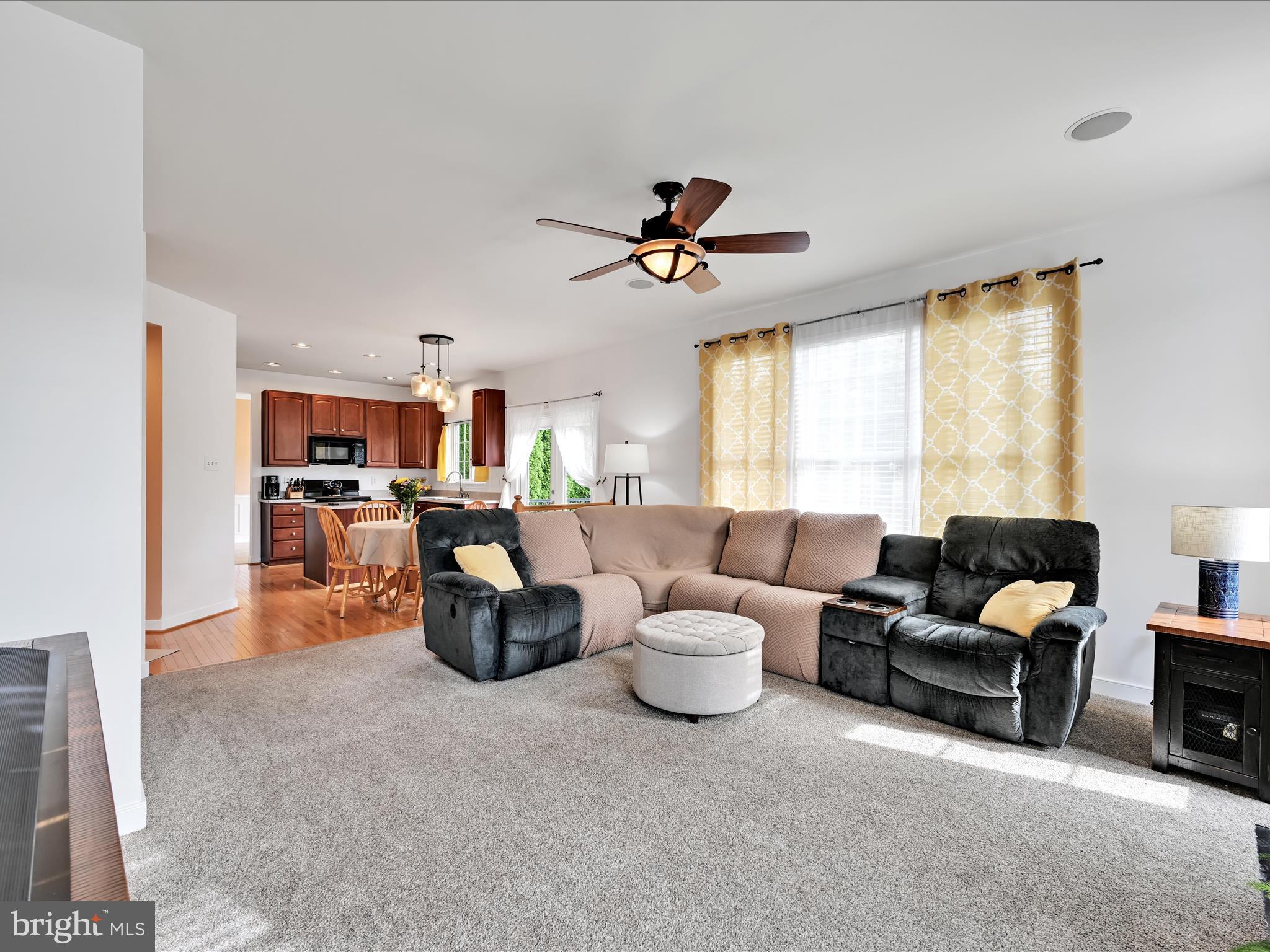 7641 Pinewild Road Seven Valleys, PA 17360 - Photo 14 of 42 a living room with furniture and a large window
