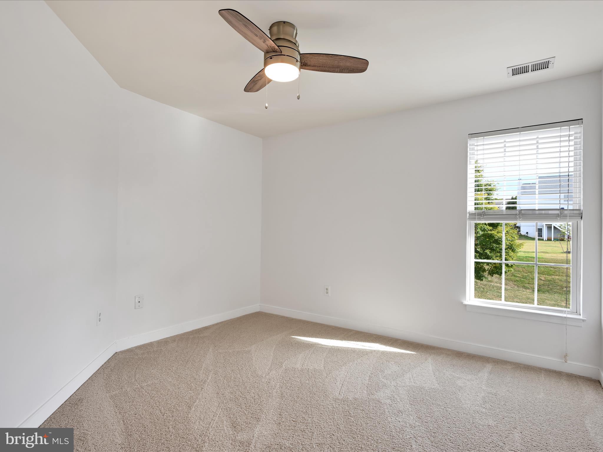 7641 Pinewild Road Seven Valleys, PA 17360 - Photo 21 of 42 an empty room with a window