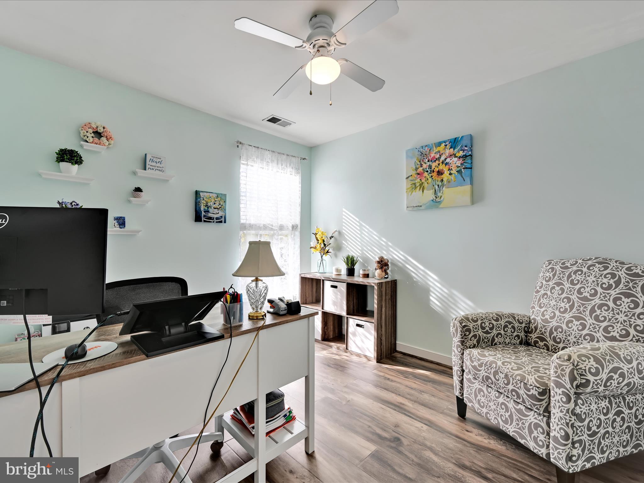 7641 Pinewild Road Seven Valleys, PA 17360 - Photo 26 of 42 a living room with furniture and a flat screen tv