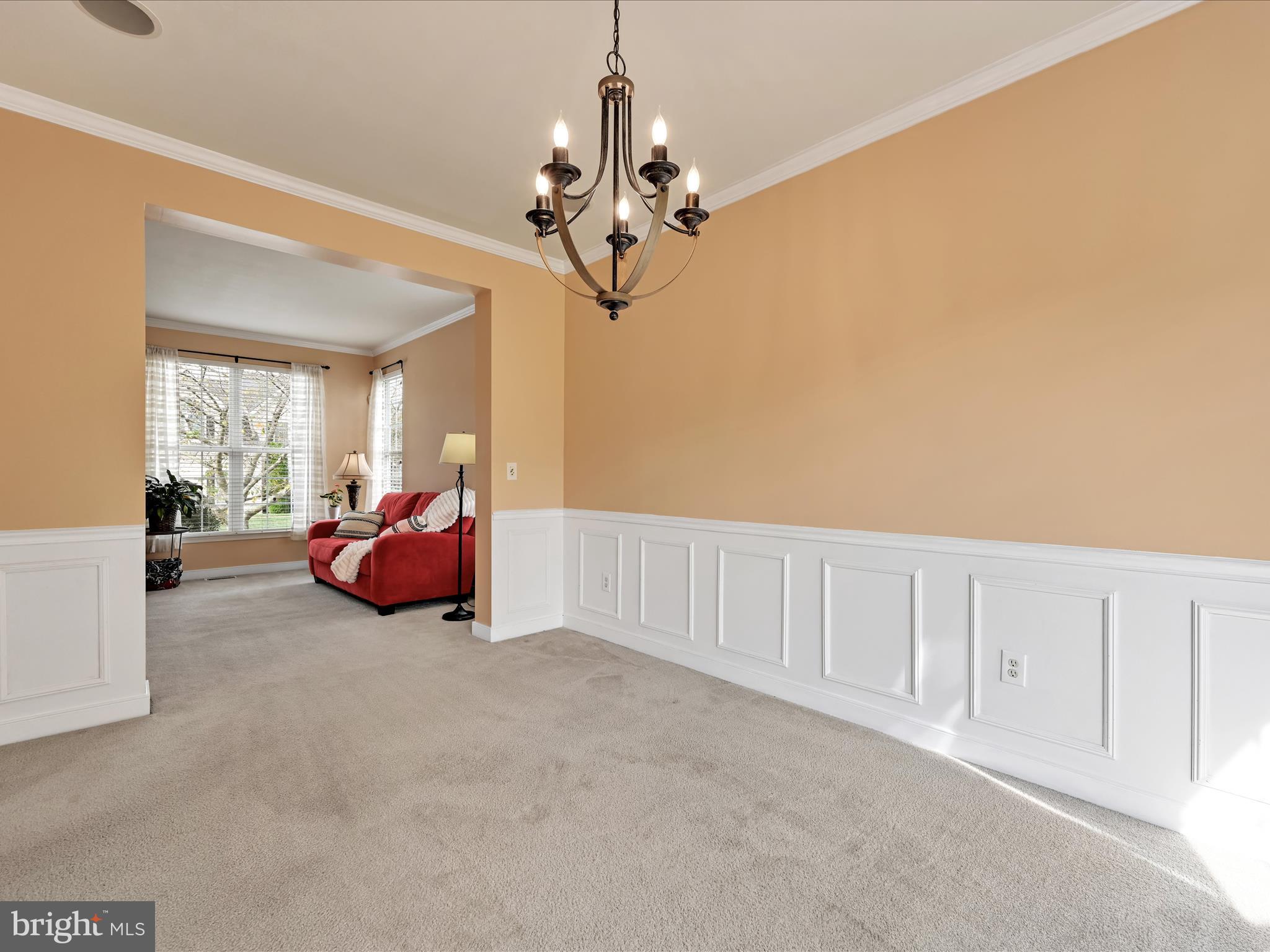 7641 Pinewild Road Seven Valleys, PA 17360 - Photo 7 of 42 a bed room with furniture and a chandelier