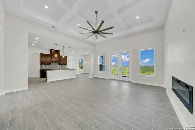 a view of livingroom with furniture flat screen tv and window