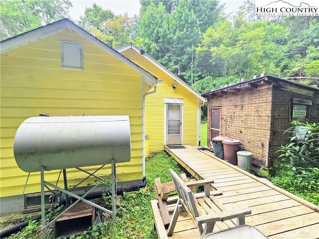 a patio with table and chairs