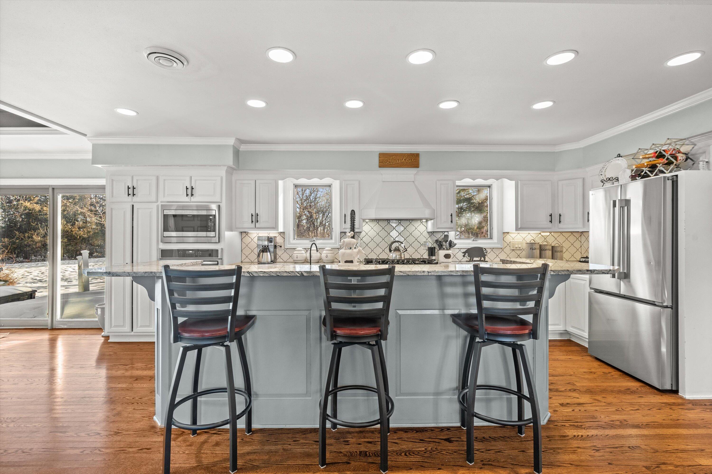 310 South Taliesin Road Wales, WI 53183 - Photo 17 of 66 20-Kitchen with Granite Countertops