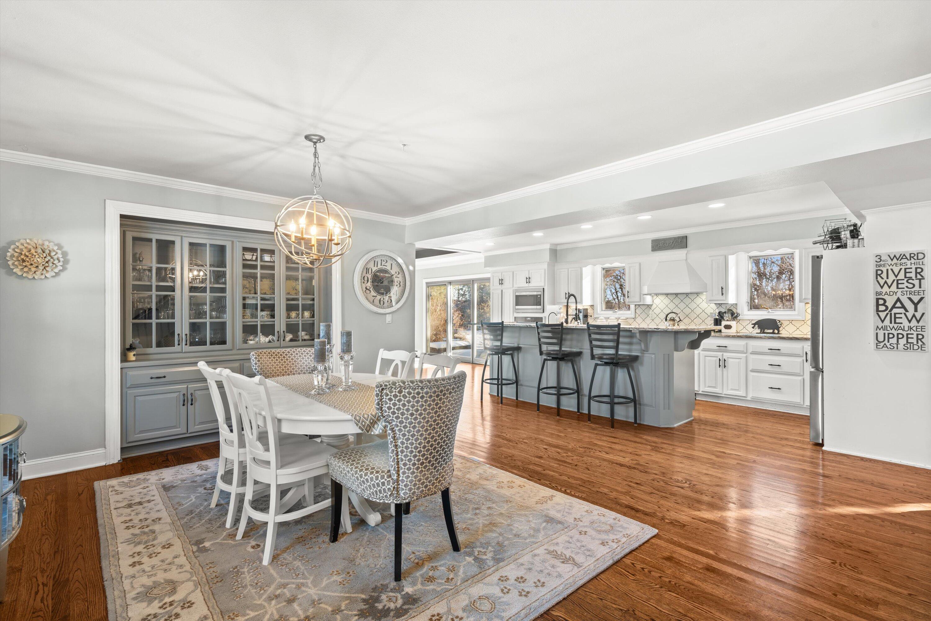 310 South Taliesin Road Wales, WI 53183 - Photo 21 of 66 16-Dining Area with Built Ins