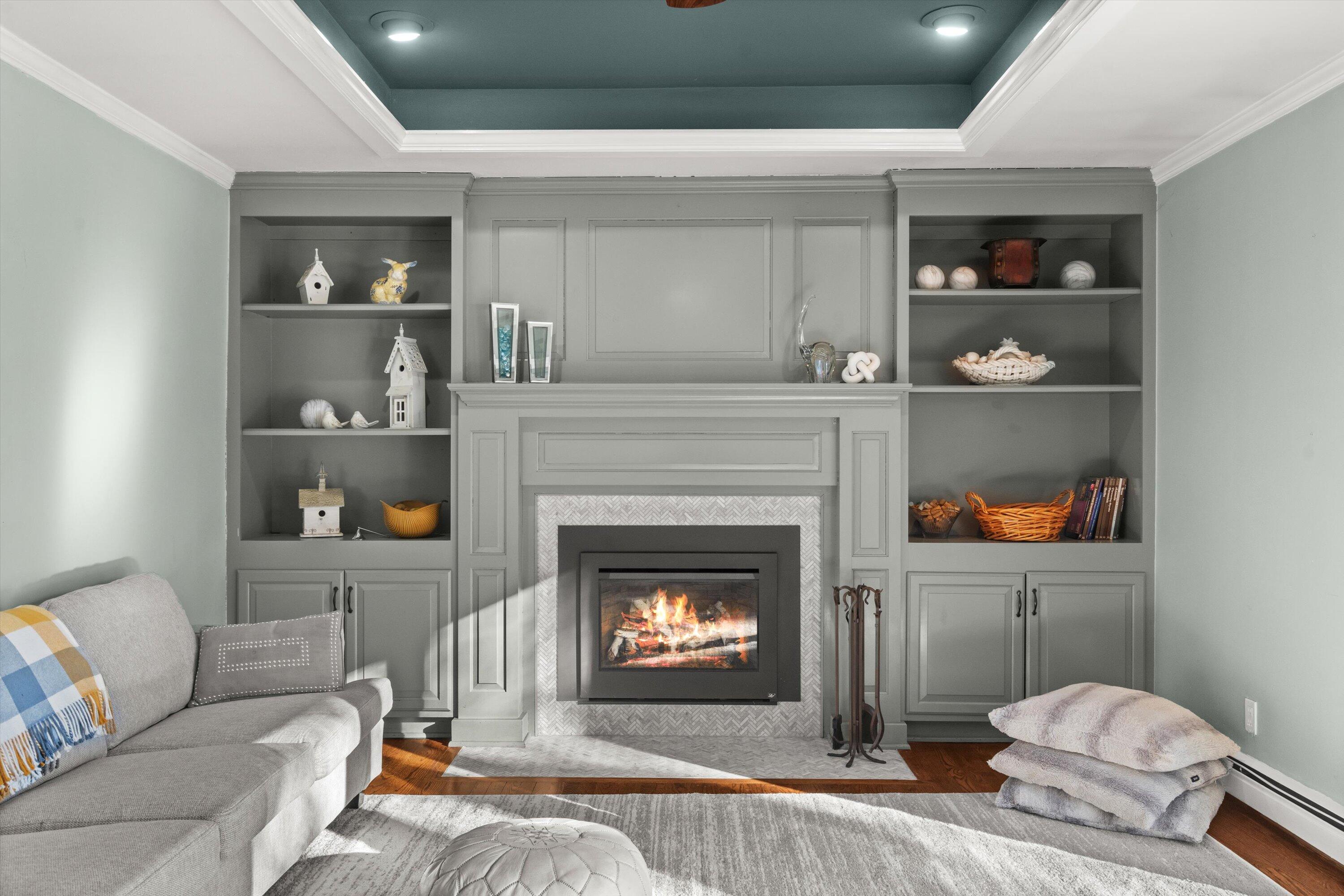 310 South Taliesin Road Wales, WI 53183 - Photo 25 of 66 23-Gas Fireplace and Built Ins