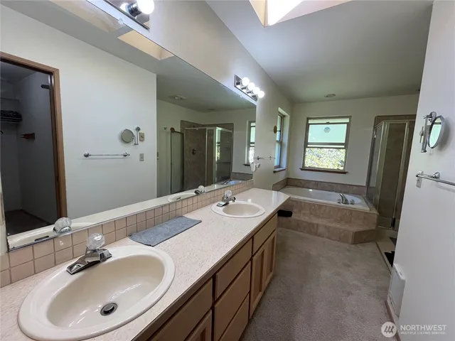 a bathroom with a bath tub