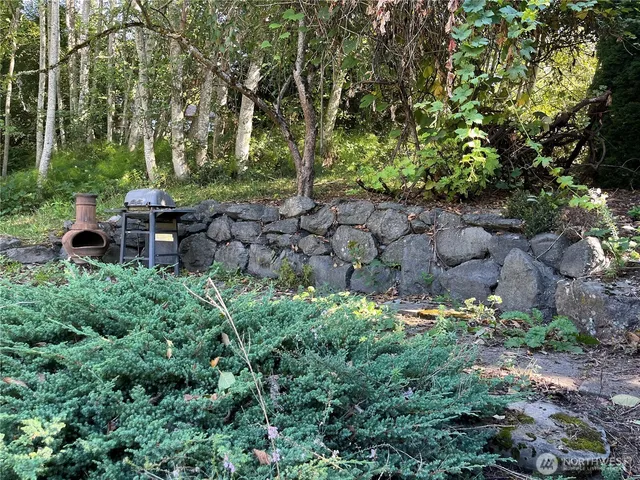 a house view with a garden space