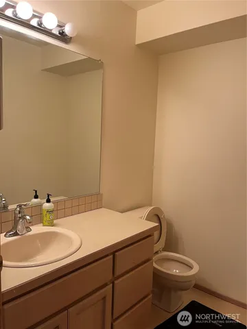 a bedroom with furniture and a fireplace