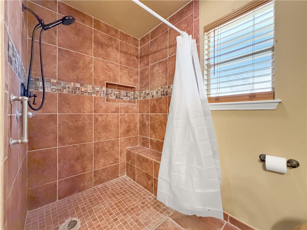 4214 Valley Circle Corpus Christi, TX 78413 - Photo 10 of 28 a bathroom with a shower