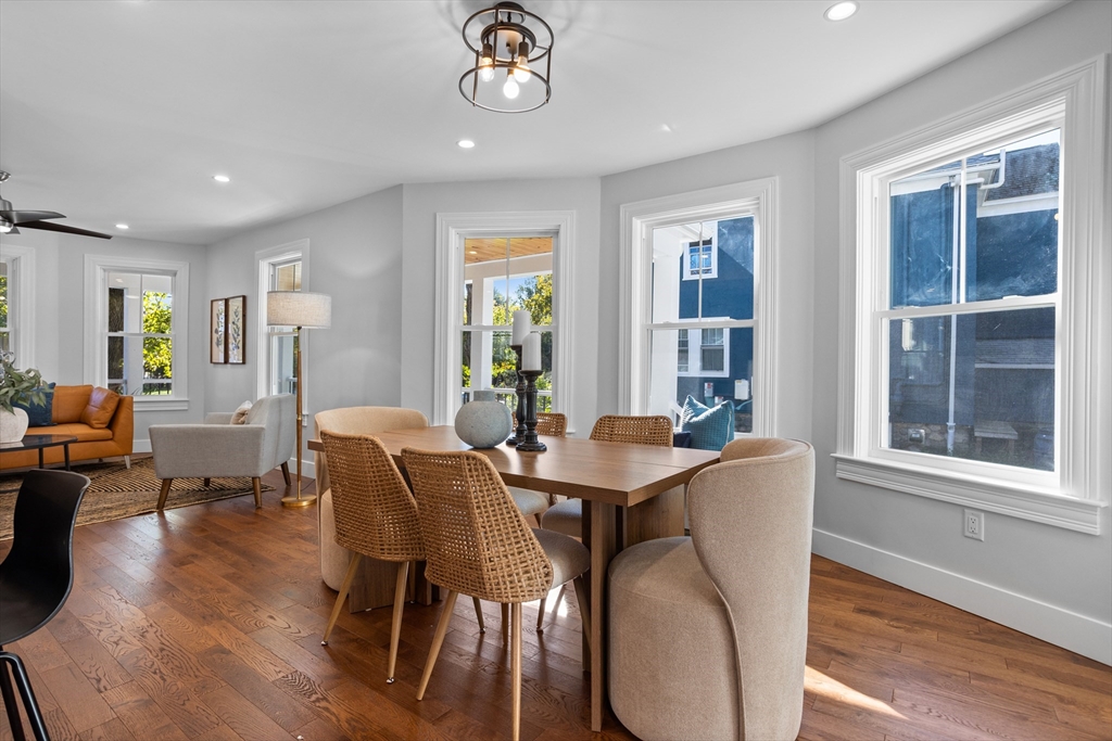 20 Tremont Street Maynard, MA 01754 - Photo 12 of 29 a view of a dining room with furniture window and wooden floor
