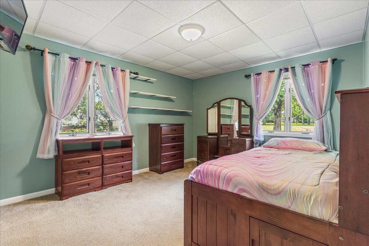 2522 Cindy Street Athens, TN 37303 - Photo 23 of 36 a bedroom with a bed dresser and a window