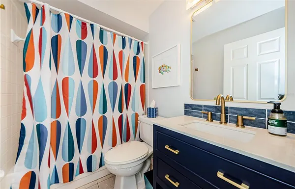 a bathroom with a sink and a toilet