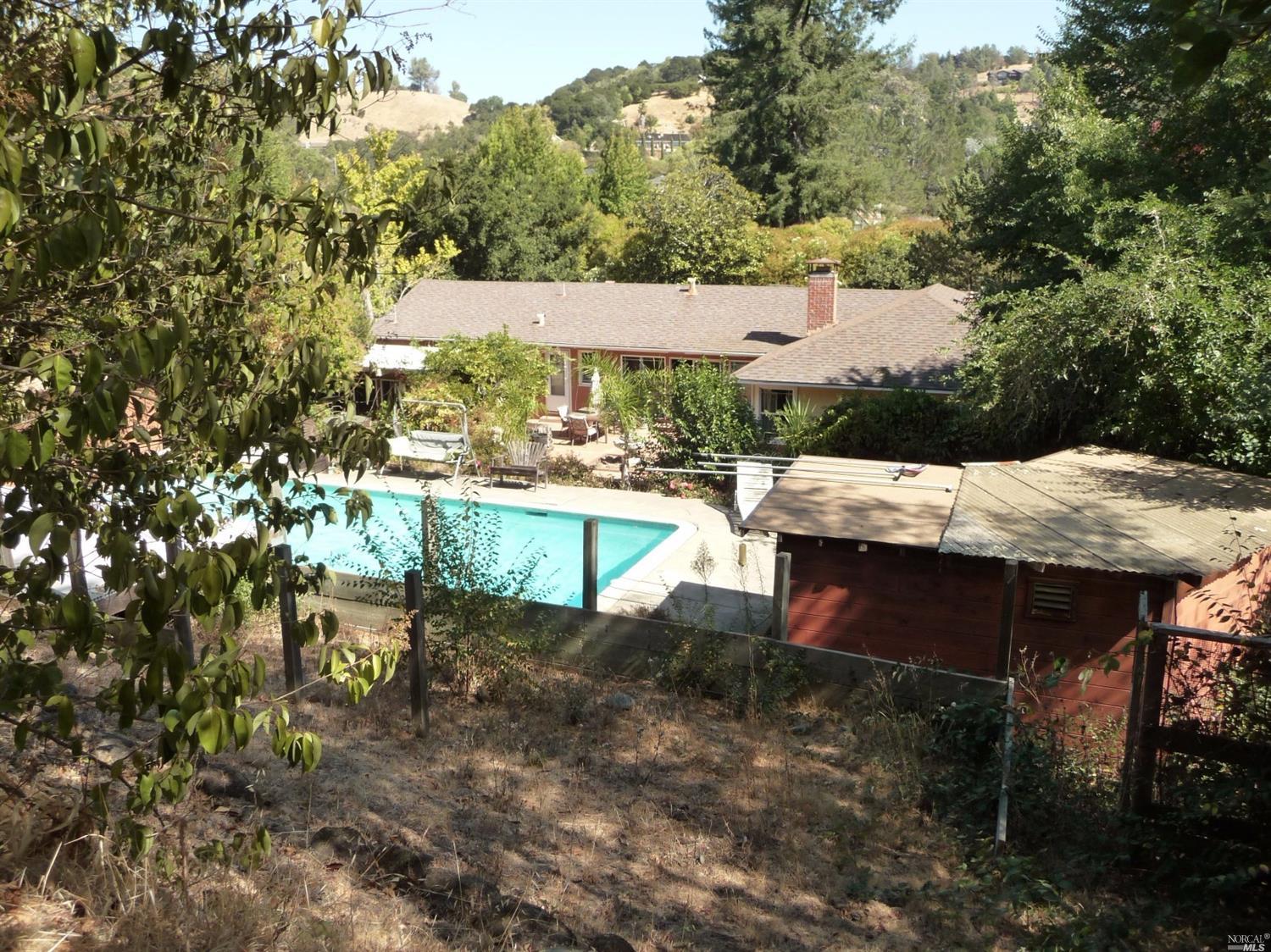 811 Butterfield Road San Anselmo, CA 94960 - Photo 1 of 1 a view of a swimming pool with a patio