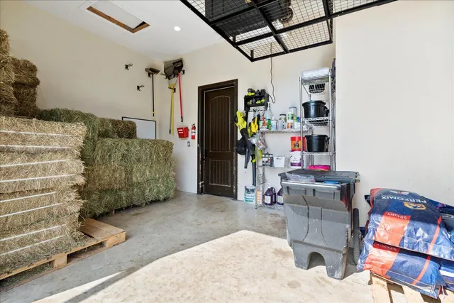 a bathroom with a granite countertop sink a mirror and vanity