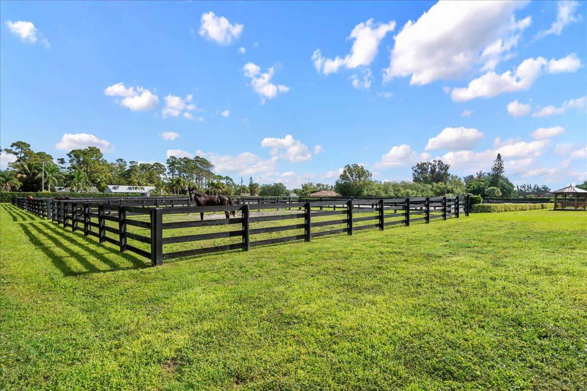 16575 Van Gogh Boulevard, Unit HORSE STALLS) Loxahatchee, FL 33470 - Photo 28 of 50 a view of a big yard