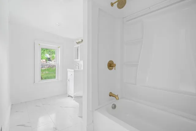 a bathroom with a bathtub