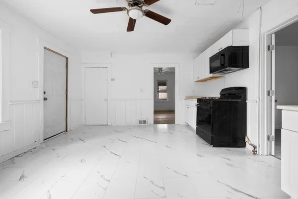 a view of a livingroom with a flat screen tv