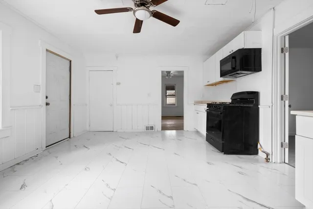 a view of a livingroom with a flat screen tv