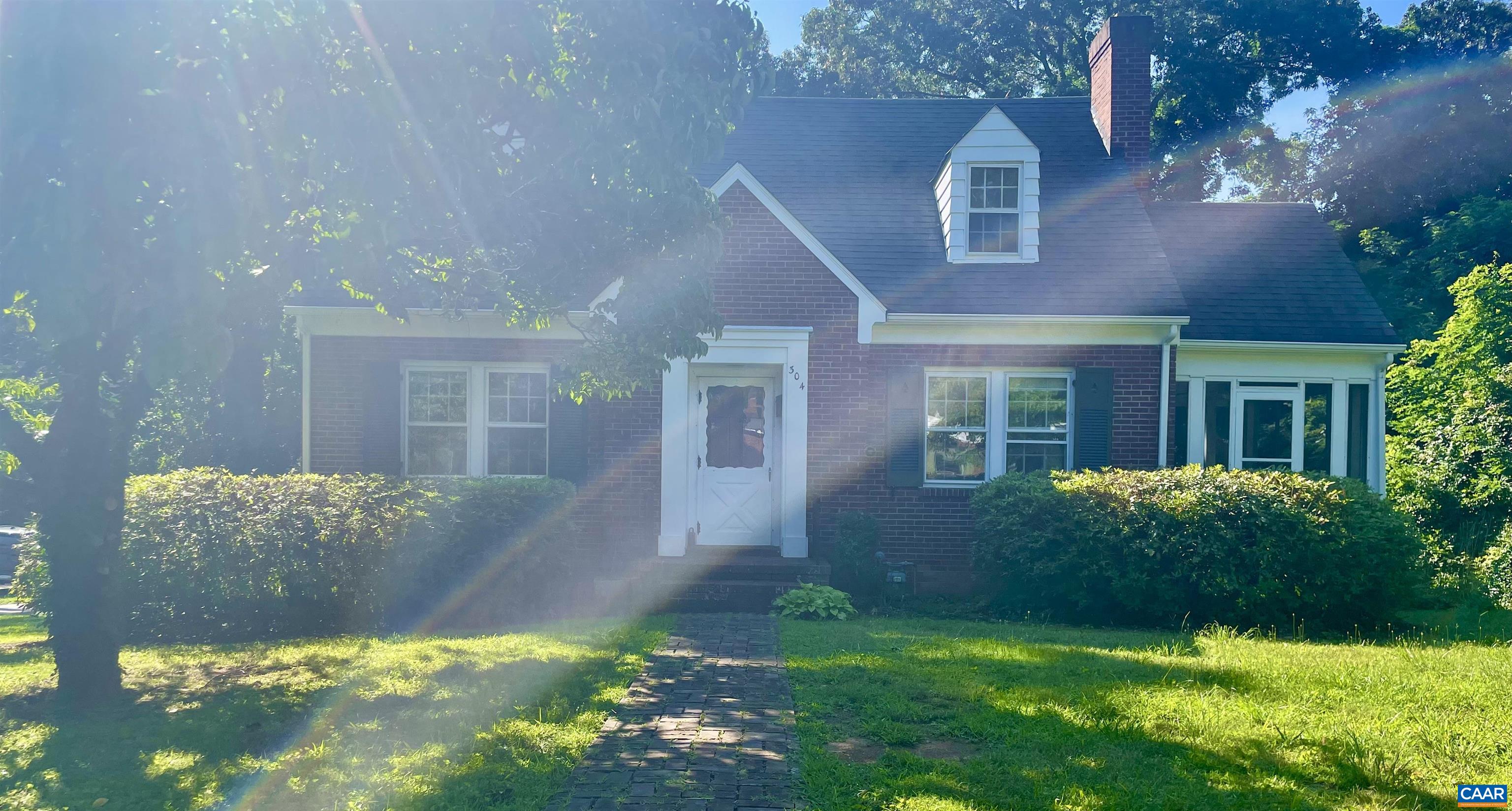 304 Alderman Road Charlottesville, VA 22903 - Photo 12 of 18 front view of a house with a yard
