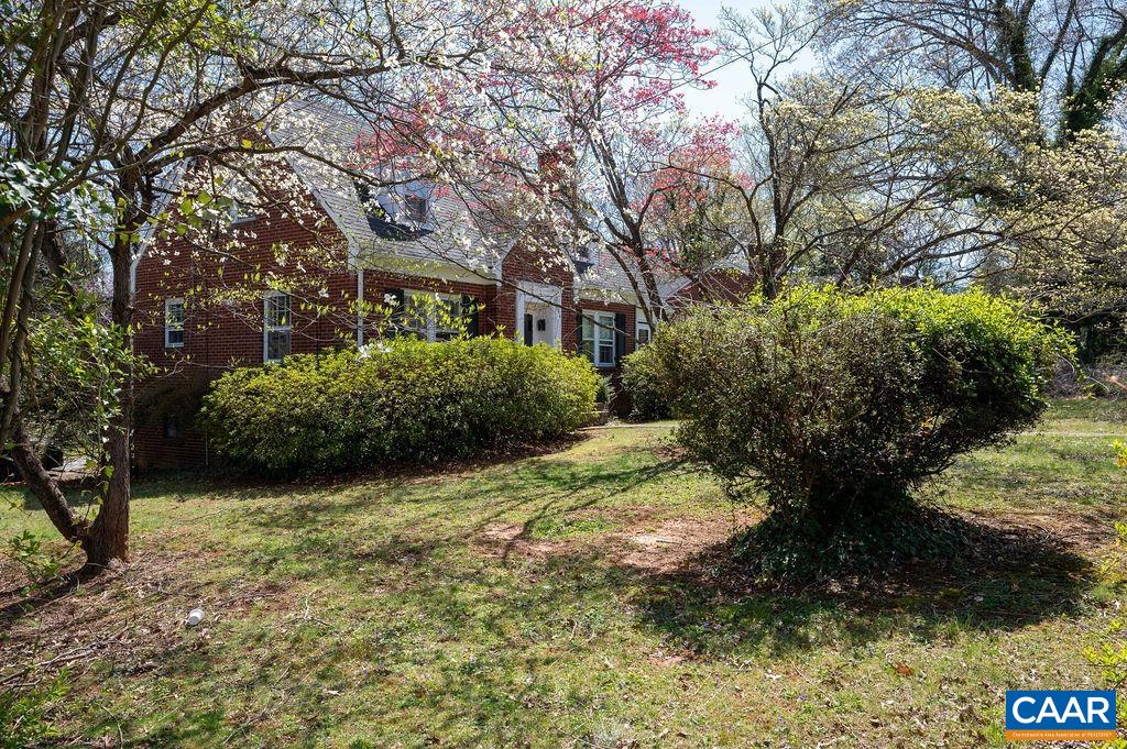 304 Alderman Road Charlottesville, VA 22903 - Photo 14 of 18 a front view of a house with a yard