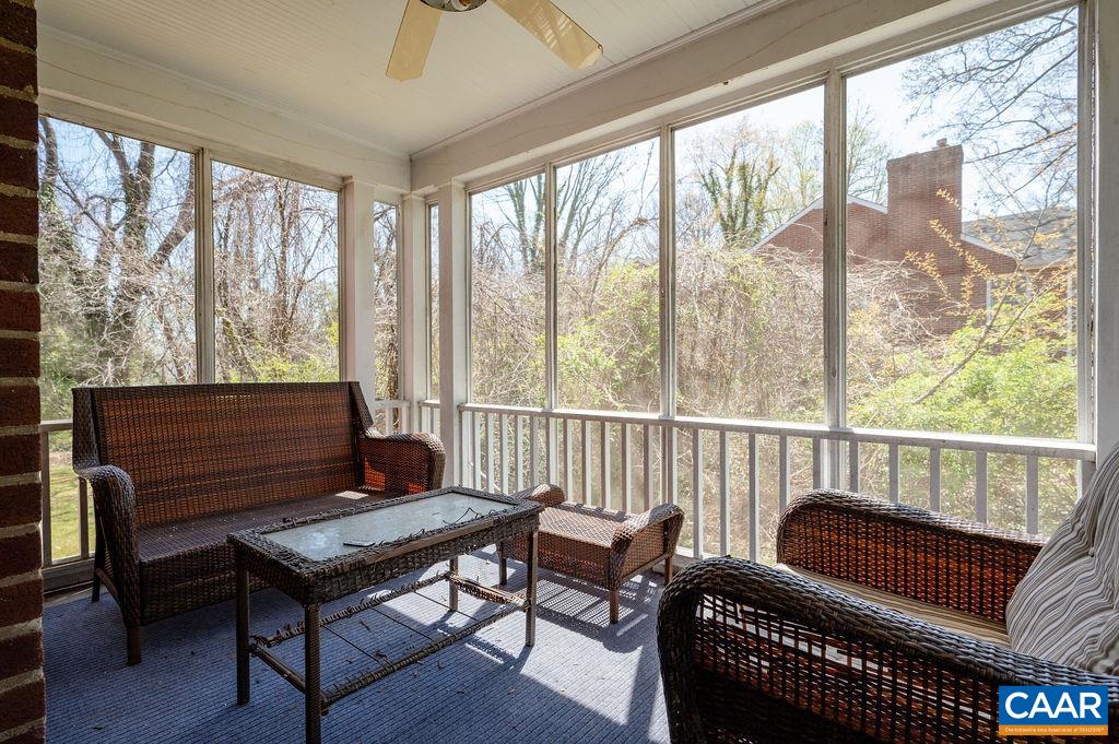 304 Alderman Road Charlottesville, VA 22903 - Photo 6 of 18 a view of a room with furniture and a window