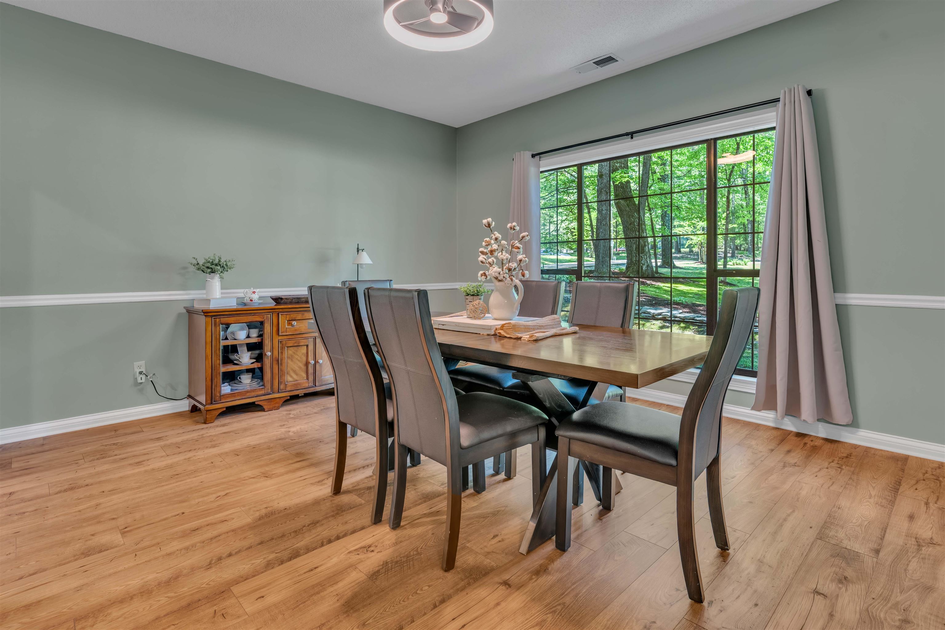 400 Great Oaks Road Eads, TN 38028 - Photo 18 of 40 a dining room with furniture and wooden floor